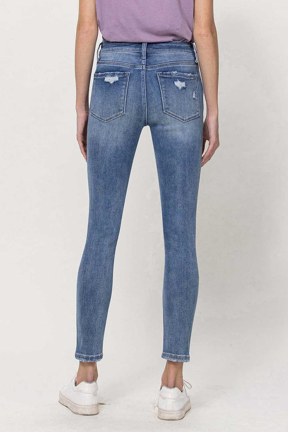 Mid Rise Distressed Skinny Jeans