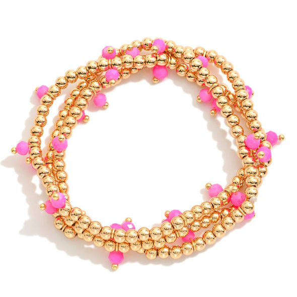 Set of 3 Gold Bracelets w/ hot pink bead