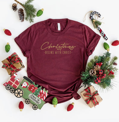 Maroon Christmas Begins with Christ Short Sleeve Graphic Tee I