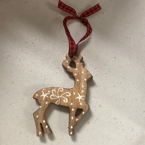 Wooden reindeer with white design